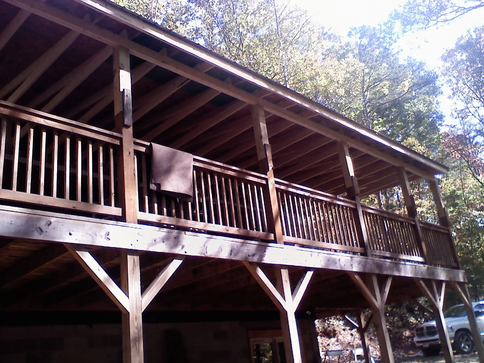 Timber framing under a new elevated porch and deck — Roof Leak Repair in Okolona by Roofing Brothers